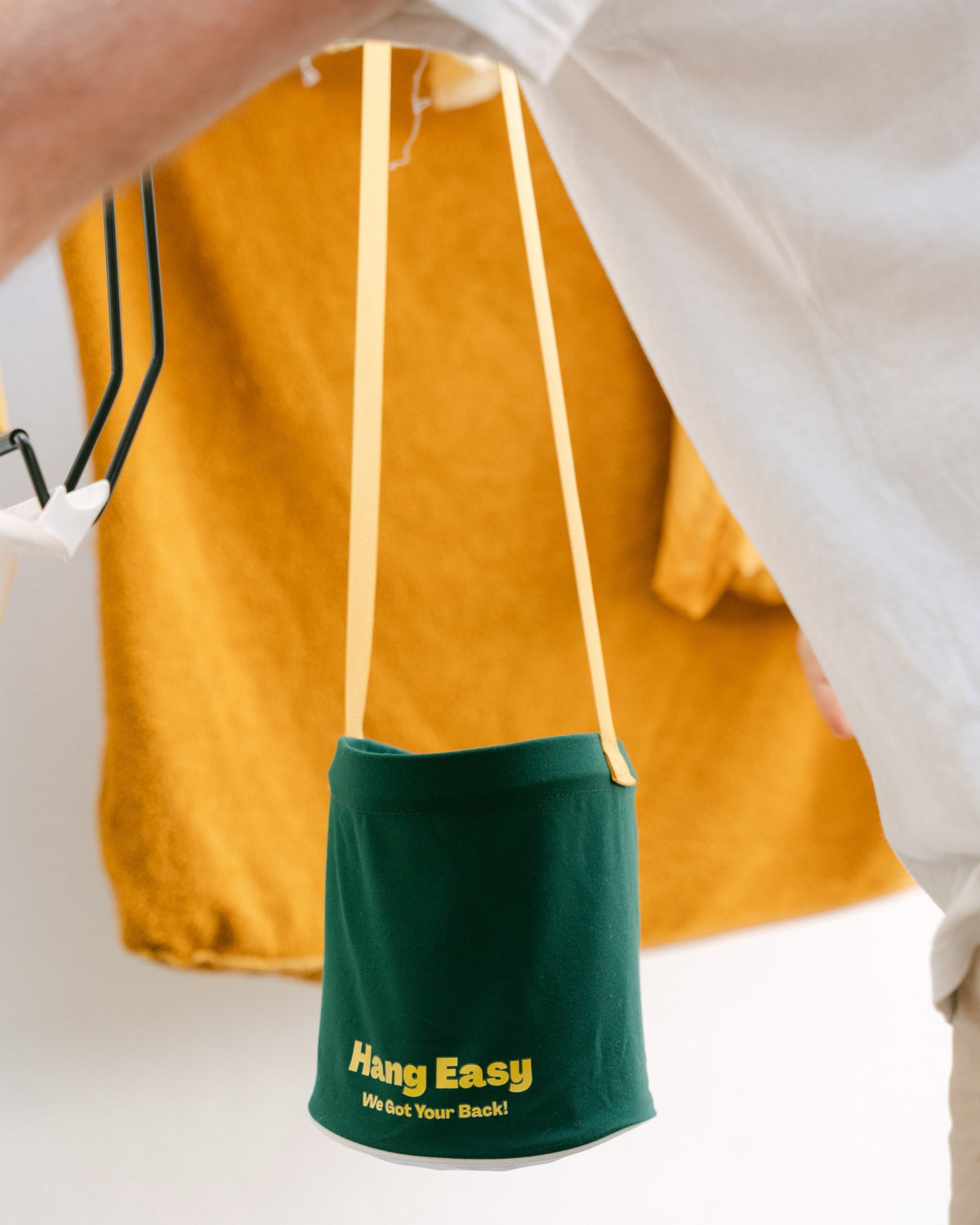 Hang Easy Peg Bag within reach while hanging mustard washing