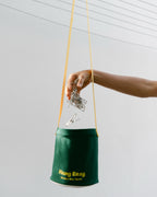 Dropping stainless steel pegs into the Hang Easy Peg Bag